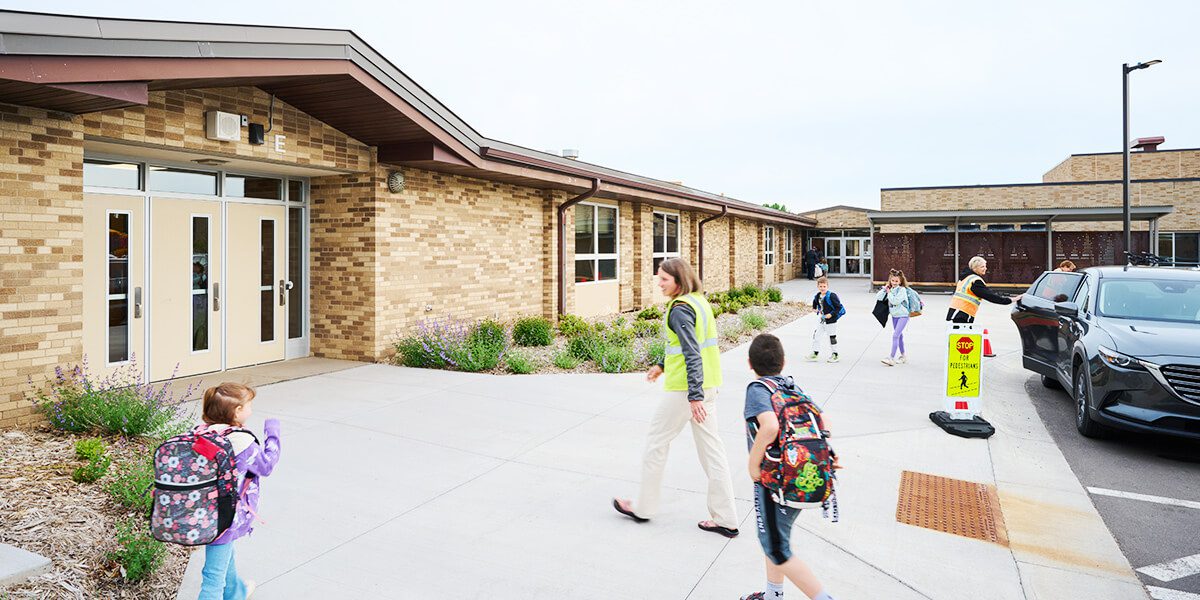 Kids getting dropped off at school
