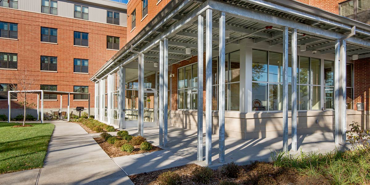 Apartment exterior with covered walkway