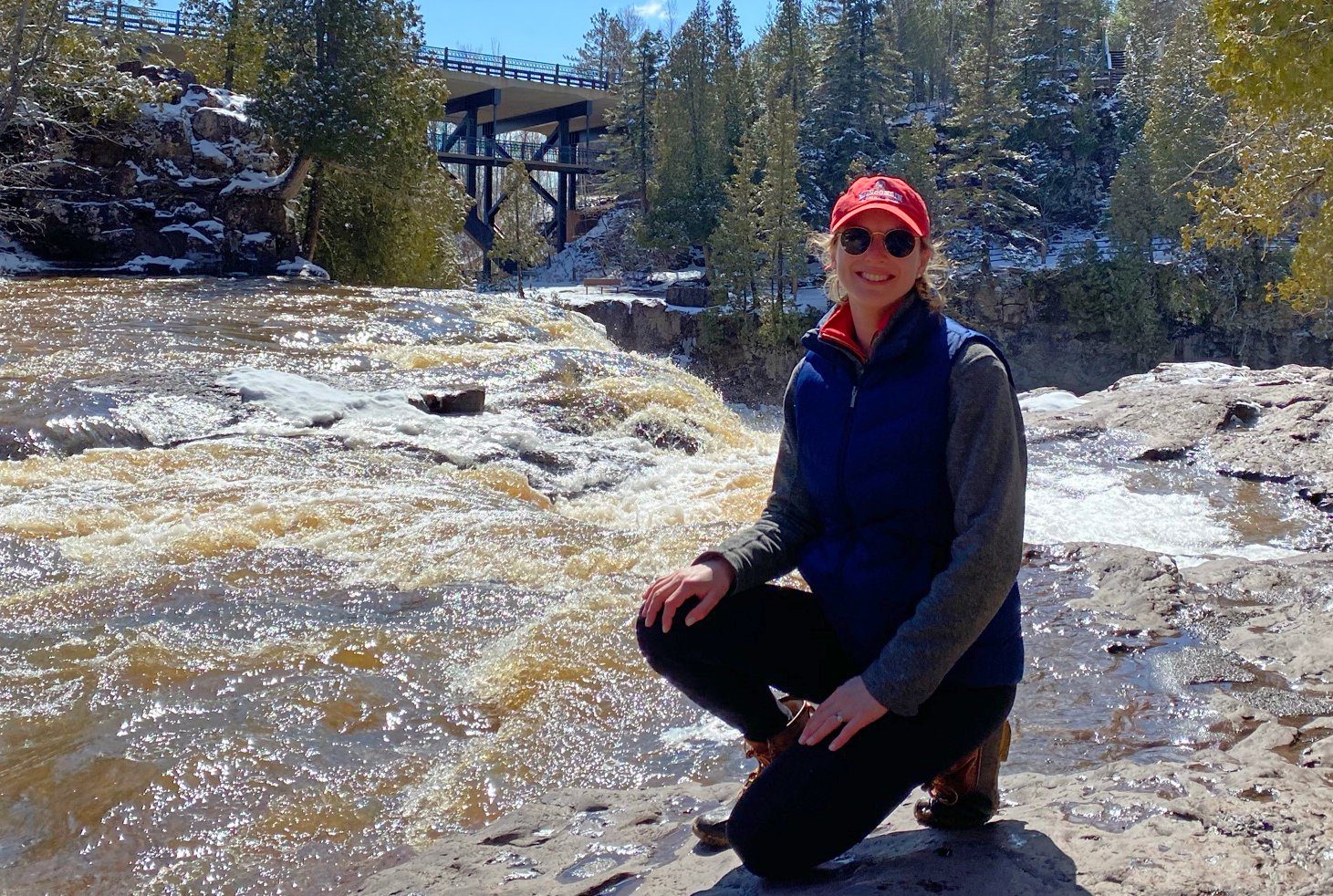 Woman at river's edge