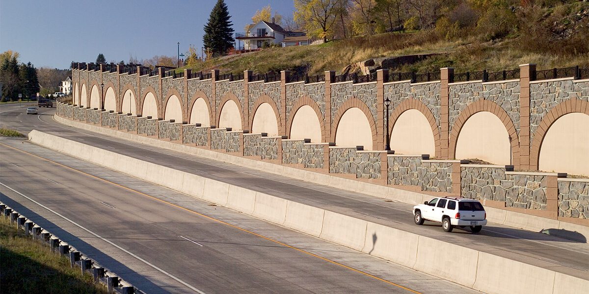 highway with white truck driving on it
