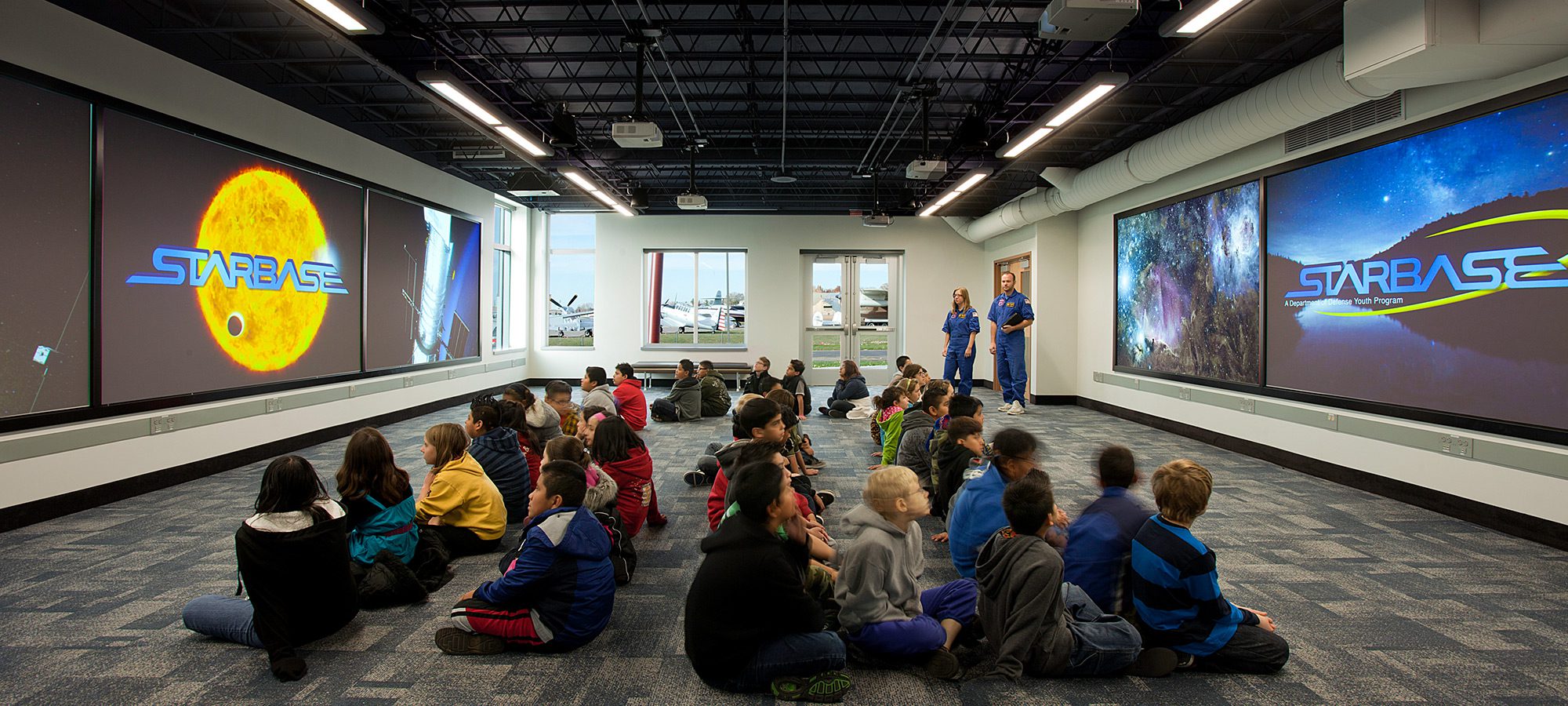 children sitting on floor